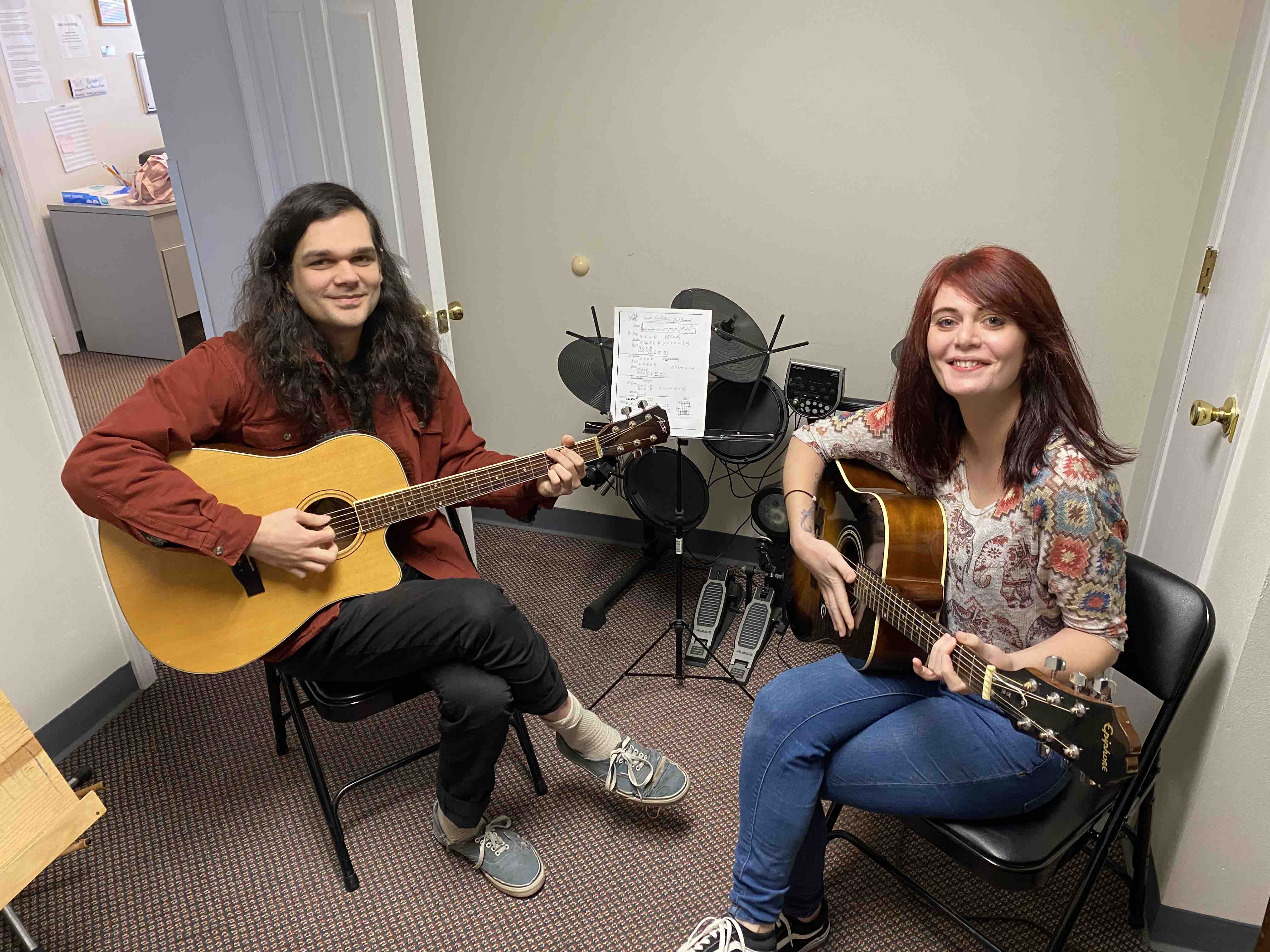 Stephen teaching a guitar lesson at the A Major Music studio